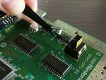 A set of tweezers is very helpful for both steadying and tilting the components.