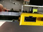 Shielding plate fits on over the new, taller capacitors just fine.